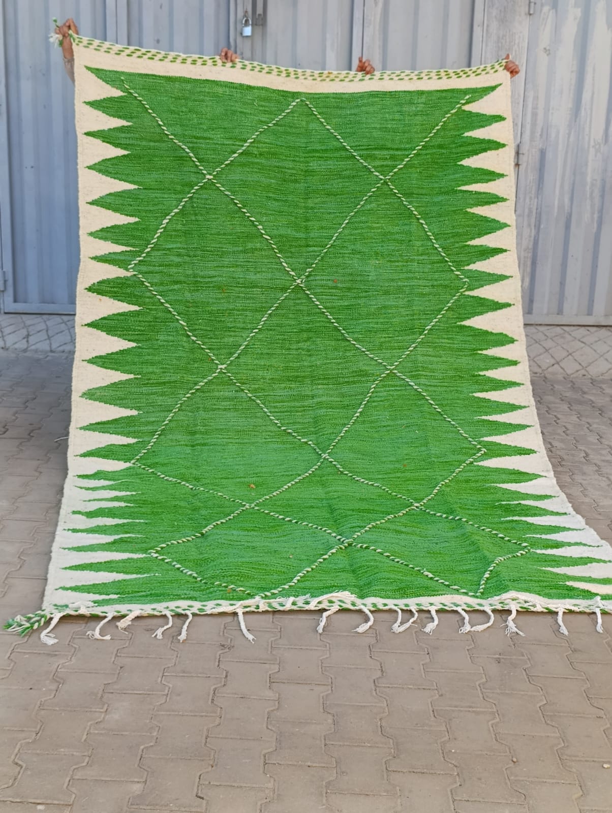 Green Zanafi rug with white border