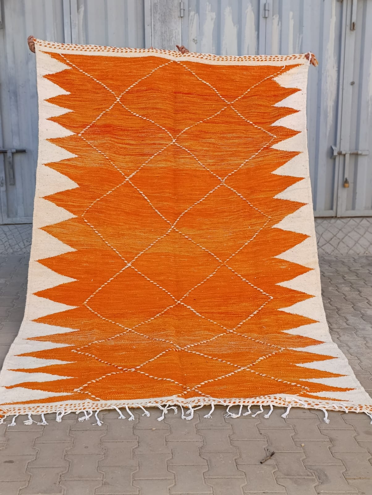 Orange Zanafi rug with cream borders