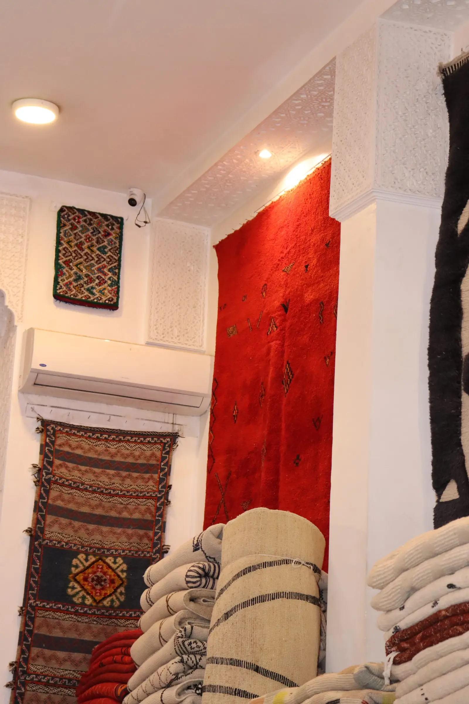A red rug in the Toubkal Rugs showroom